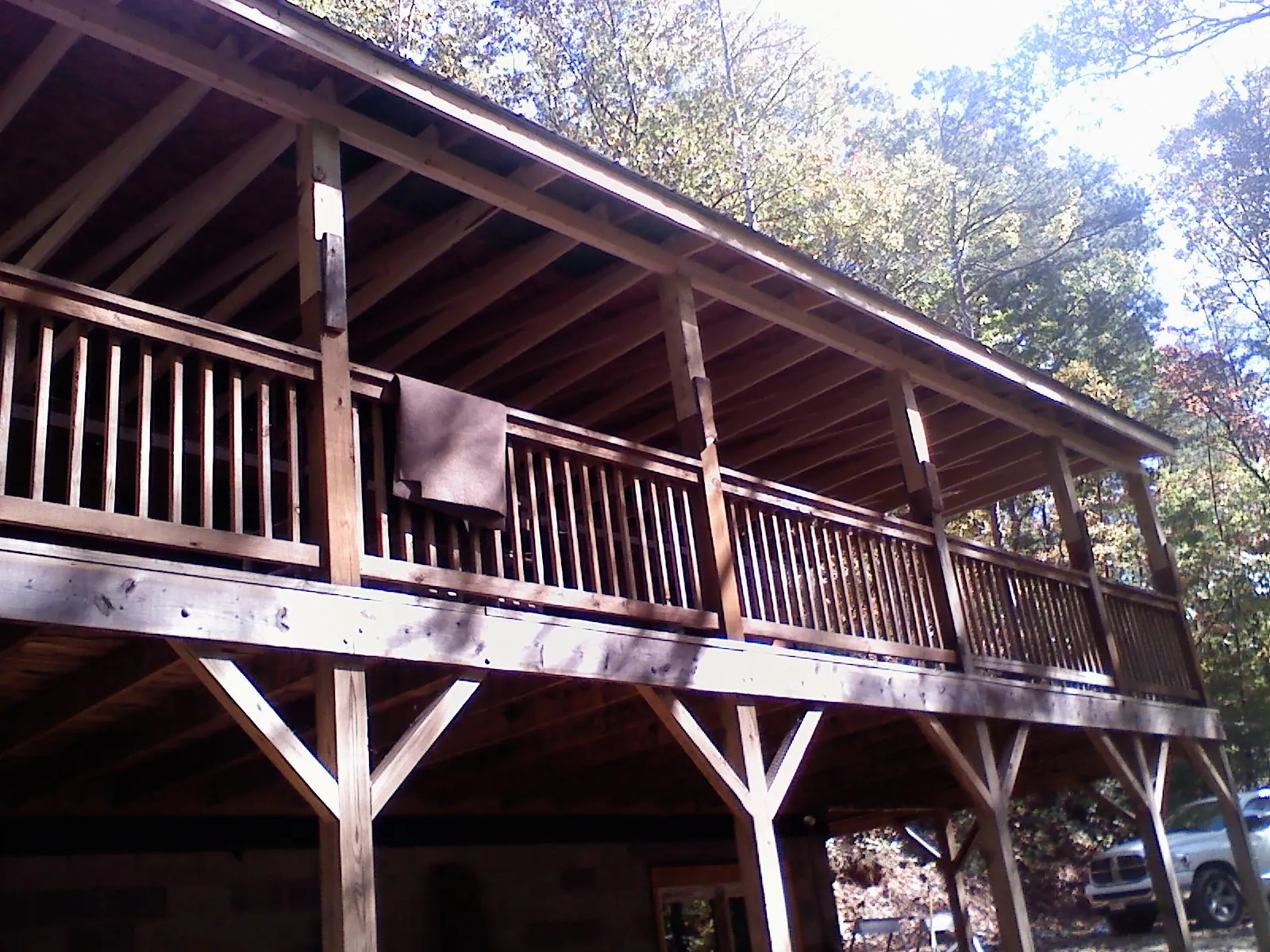 Timber framing under a new elevated porch and deck — Roof Leak Repair in Otis Orchards by Roofing Brothers